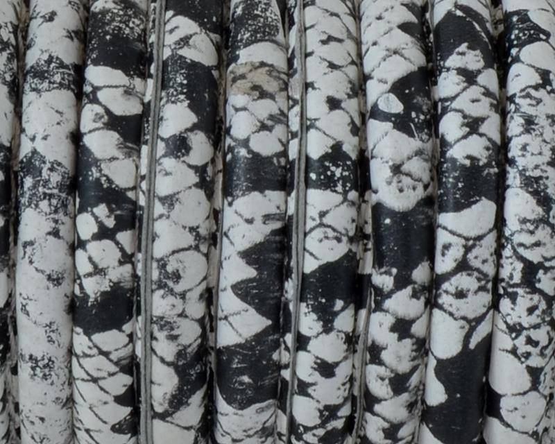 Round Stitched Suede cord. 7mm. Snake. White-black.