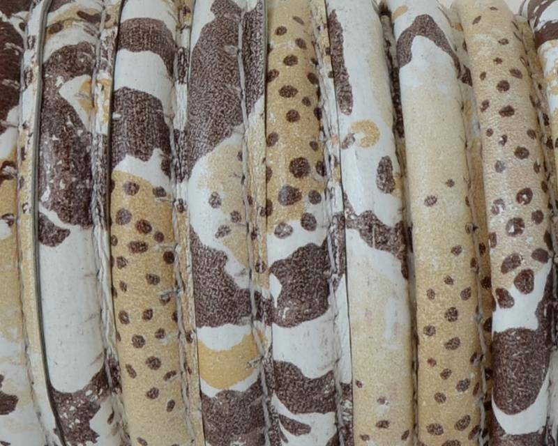 Round Stitched Suede cord. 7mm. Snake. White-brown.