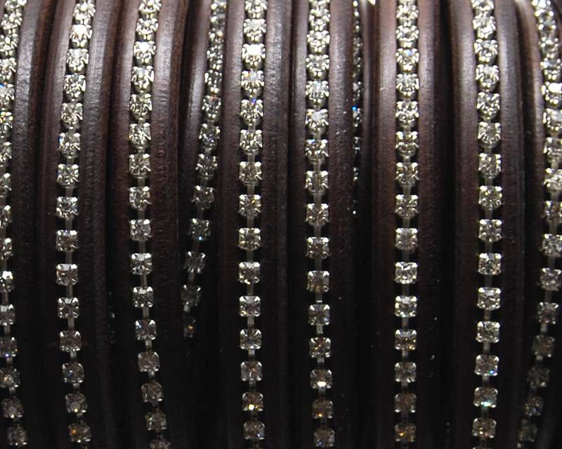 REGALIZ Leather cord with strass. Oval 10x6mm. Dark brown. Best qual.