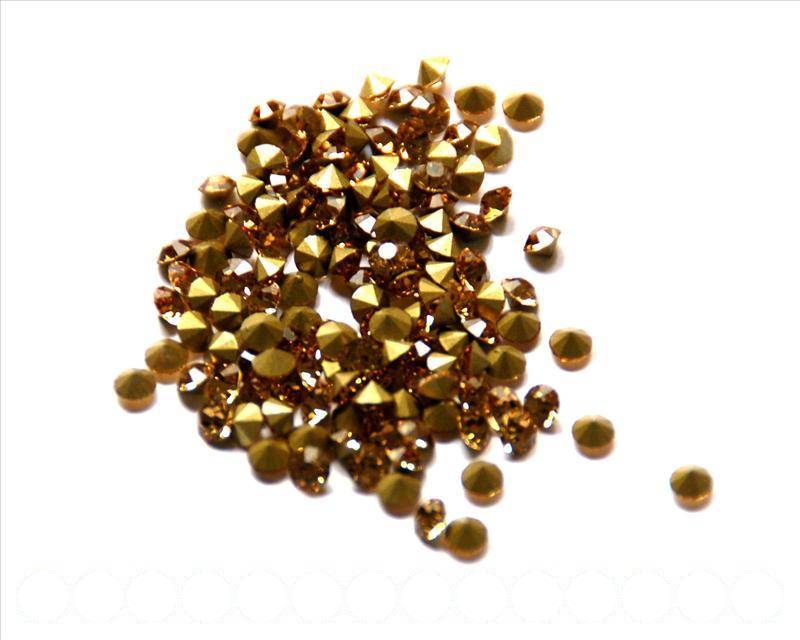 Rhinestone Cabochons. 4-4.1mm. Light brown.