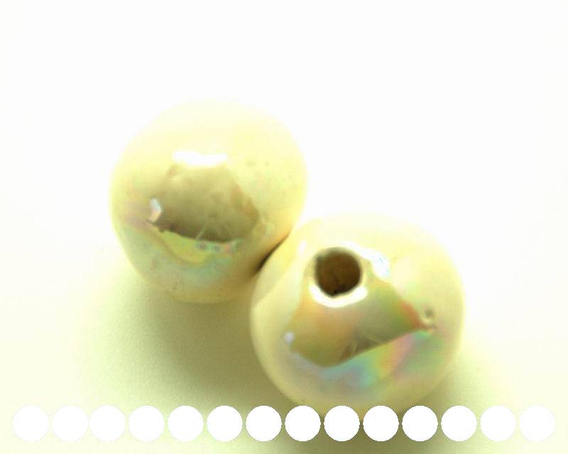 Ceramic. Round 26mm. cream color ir. Inn. 4.5-5mm.