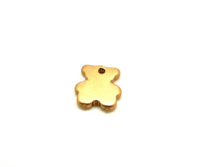Ceramic. Bear. 27x24mm. Gold mat. Inn.3mm. approx.