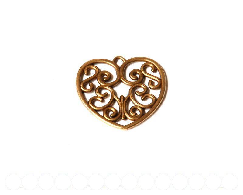 Zamak. Pendant, Heart 38mm. Antique gold. Inn. 3mm.