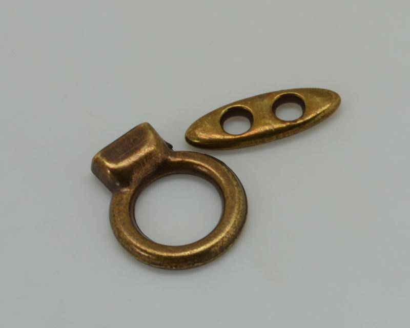 Zamak. Cierre palo 10x2,5mm. oro viejo. Int.12x3mm/4mm