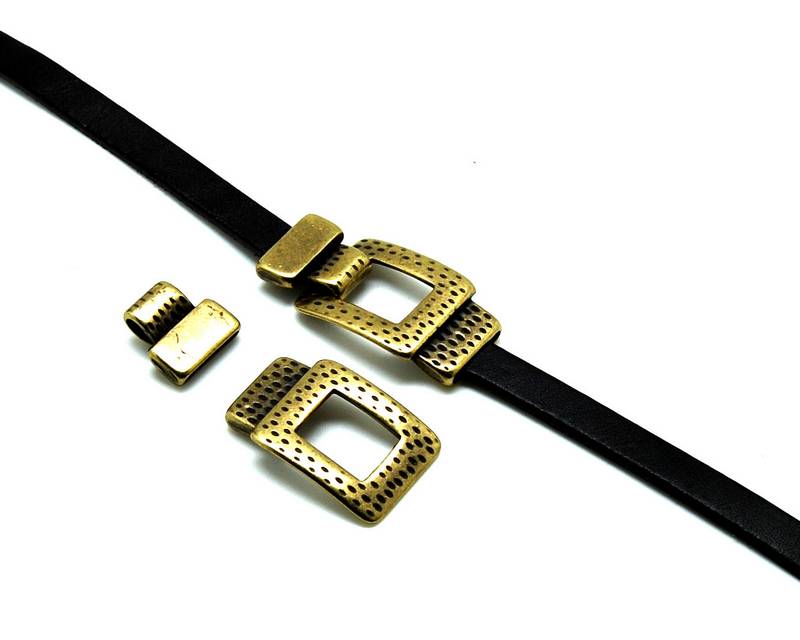 Zamak. Clasp square. 49x25mm. Antiq.gold. Inn.2.8x16mm.