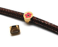 Zamak. Coin. 13mm. Gold-pink. Inn.10x5mm.