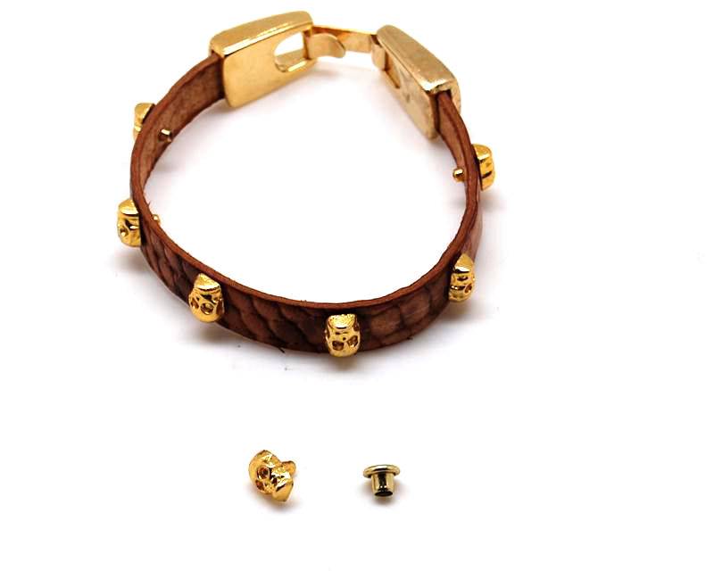 Zamak. Rivet. Skull. 8x6mm. Gold color.