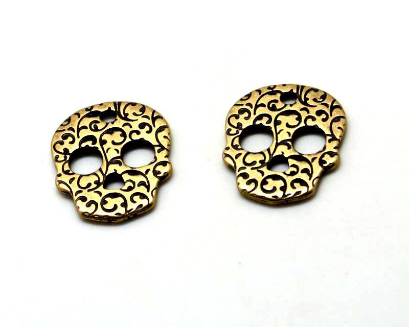 Zamak. Pendant. Skull. 26x33mm. Antique gold. Inn.3.5mm.