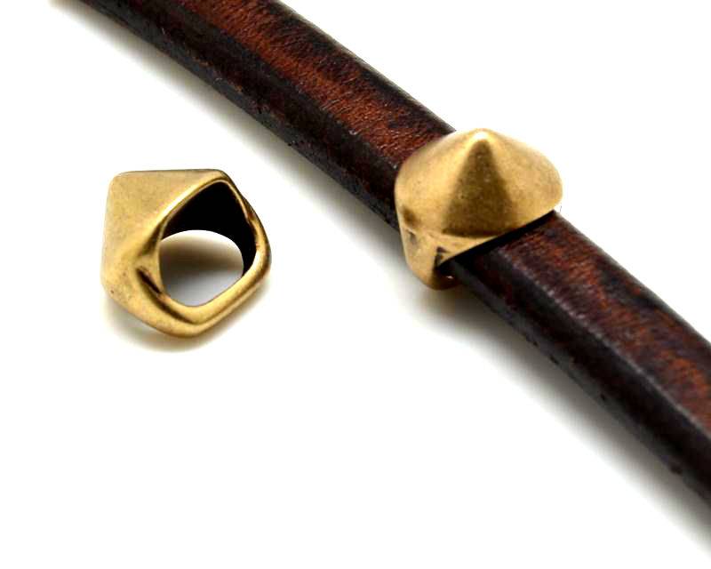Zamak. Regaliz motif spike. 13x14mm. Silver color. Inn.10x7mm