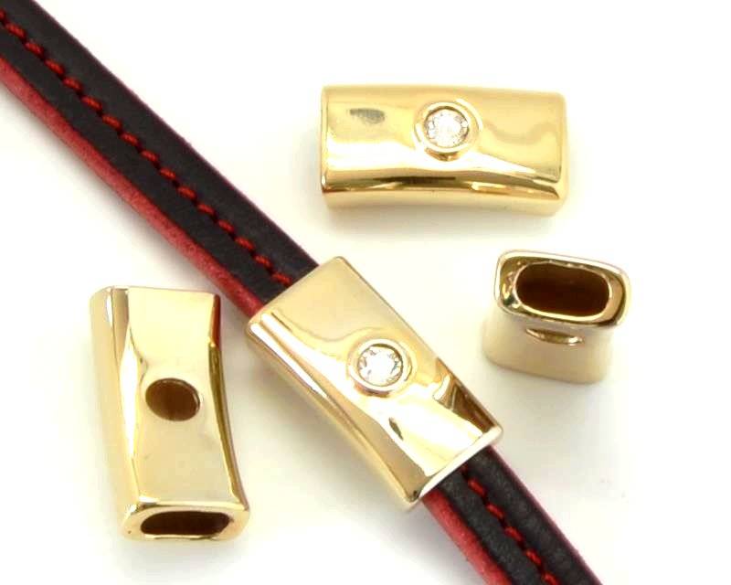 Zamak/Swarovski. Tube. 1strass. 28x14x7mm. Gold-crystal. Inn.10x5mm.