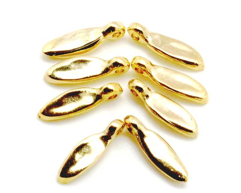 Zamak. Pendant. Wings. 15x6.5mm. Gold color. Inn.2mm.