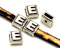 Zamak. Square. 9mm. Letter E . Silver color. Inn.6x2.5mm.