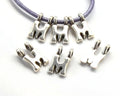 Zamak. Pendant. Letter M. Silver color. 9mm. Inn.2.2mm.