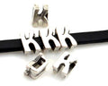 Zamak. Letter K. 9.5mm. Silver color. Inn.6x2.5mm.