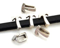 Zamak. Letter T. 9.5mm. Silver color. Inn.6x2.5mm.