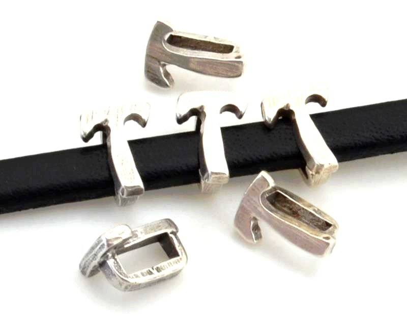 Zamak. Letter T. 9.5mm. Silver color. Inn.6x2.5mm.