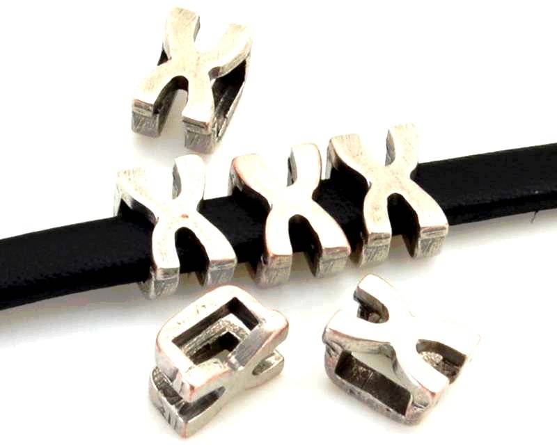 Zamak. Letter X. 9.5mm. Silver color. Inn.6x2.5mm.