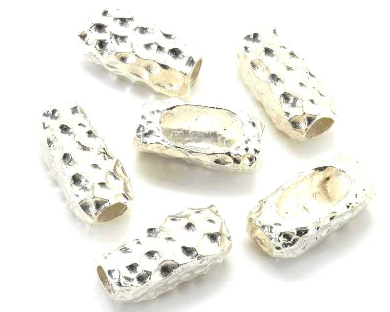 Zamak. Tube. 23x11x9mm. Light silver color. Inn.5.2mm.