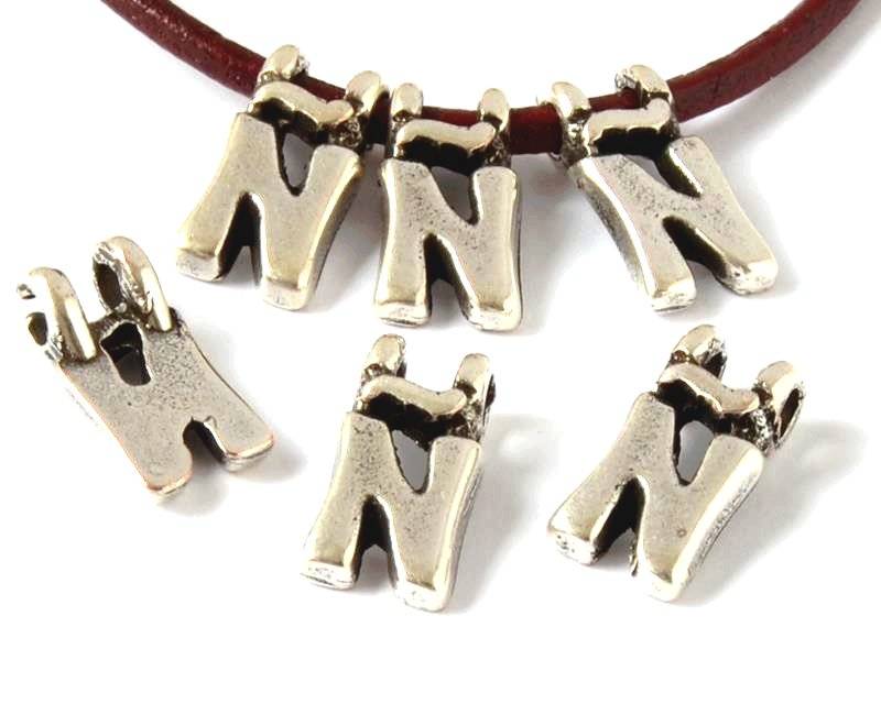Zamak. Pendant. Letter Ñ. 9mm. Silver color. Inn.2.2mm.