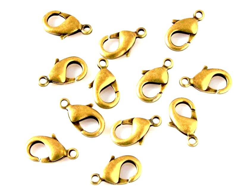 Brass. Lobster clasp. 11x19mm. Antique gold.