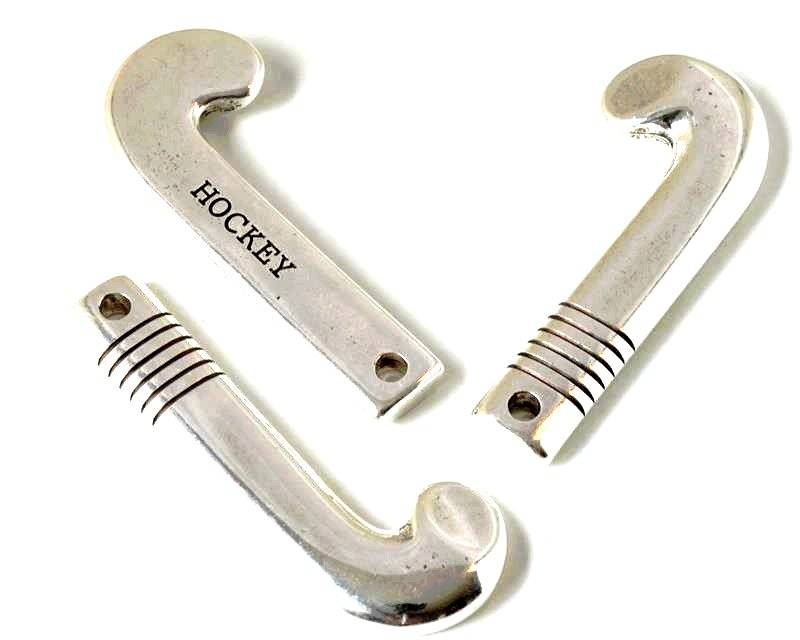 Zamak. Pendant. Stick Hockey. 71x28mm. Silver. Inn.3.8mm.