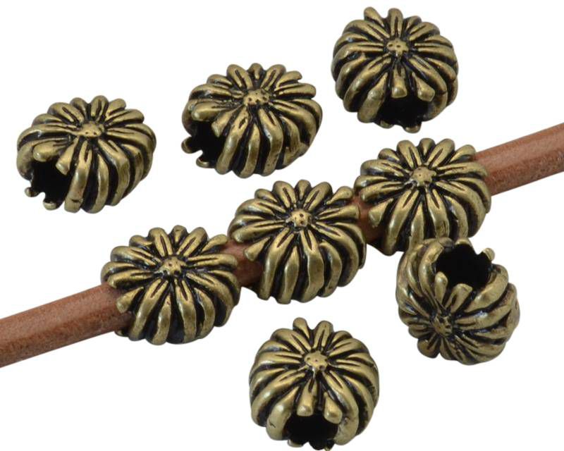 Zamak. Flower. 11x11x6mm. Antique gold. Inn.4mm.
