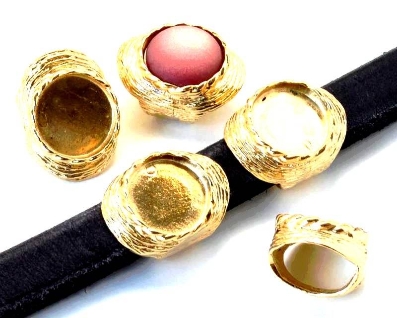 Zamak. Regaliz. Inn. coin 12mm. Gold. Inn.11x7mm.