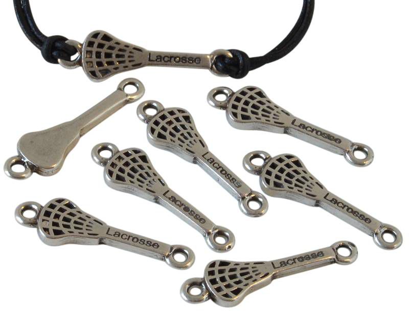Zamak. Connector. Lacrosse spade. 28x7.5mm. Silver. Inn.2mm.