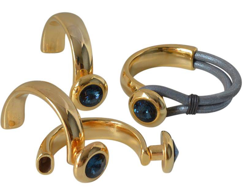 Zamak/Swarovski. Half bracelet. Coin 20mm. Gold-Montana. Inn.10x5mm.