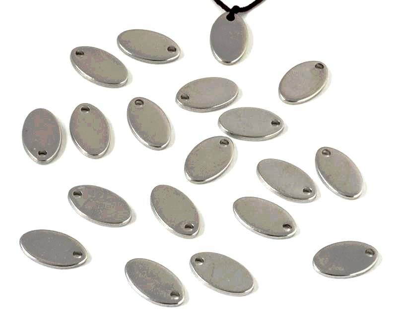 Stainless steel 304. Pendant. Oval. 7.5x12.7x1.5mm. Silver. Inn.1.5mm.