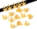 Zamak. Anchor. 7x7mm. Gold. Inn.5x2.5mm.