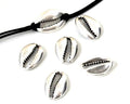 Zamak. Cowrie shell. 19x14mm. Silver.