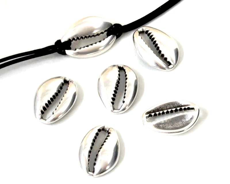 Zamak. Cowrie shell. 19x14mm. Silver.
