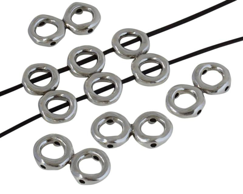Zamak. Double ring. 37x17mm. Silver. Inn.2mm/8.5mm.