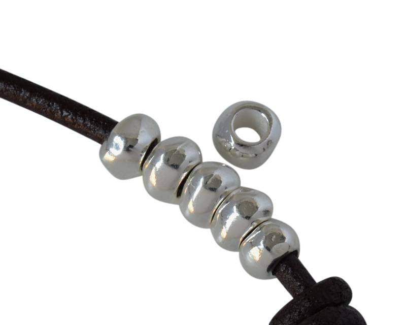 Zamak rondell. 6x3mm. Silver. Inn.3mm