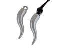 Zamak horn pendant. 29x6mm. Silver. Inn.1.8mm