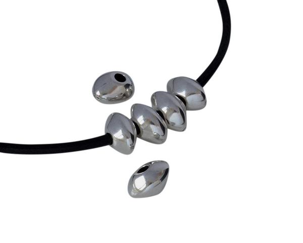 Zamak Round bead irregular 13x10x8mm. Silver. Int.3mm