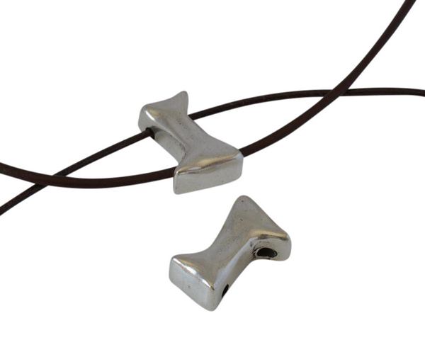 Zamak spacer 2 holes 24x13mm. Silver. Inn.3mm