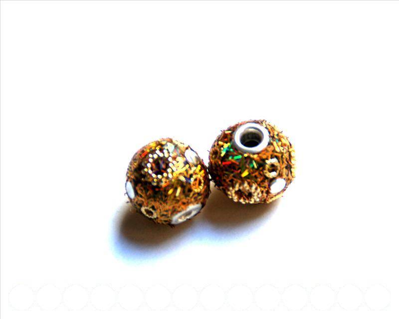 Resin. Round, 13mm. Gold color. Inn. 3mm. approx. 2 Ud.