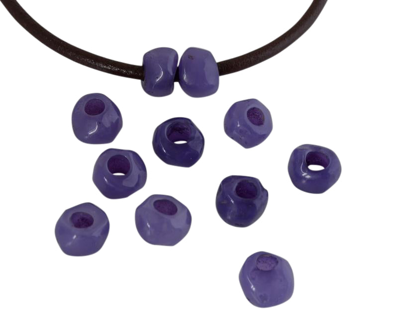 Resin irregular rondell 9x9x7mm. Marbled lilac. Inn.3mm aprox. Best Quality.