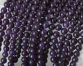 Amethyst (dyed). 8mm Round. 16-inch Strand.