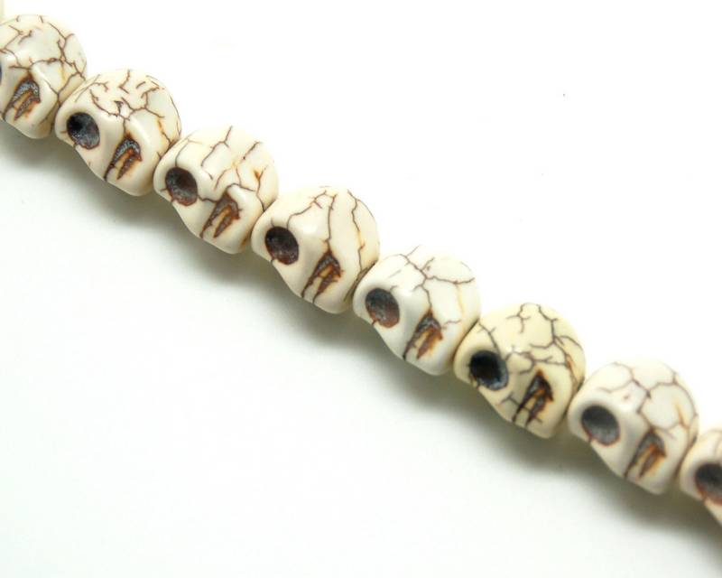 Magnesite. Skull. 14x18mm. Inn. 1mm. approx. 21 PCs.