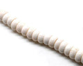 Coral. White. Rondelle. 16x8mm. 15-inch strand.