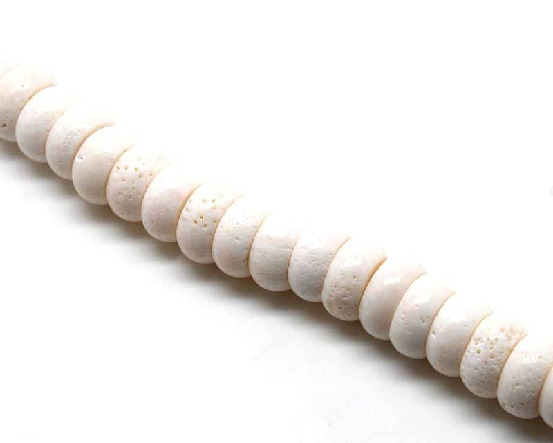 Coral. White. Rondelle. 16x8mm. 15-inch strand.