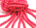 Turquoise. Dyed. Round. 6mm. Fluorescent fuchsia2.Inn.1mm.approx.