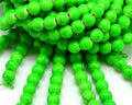 Turquoise. Dyed. Round. 8mm. Fluorescent green. Inn.1mm.approx.