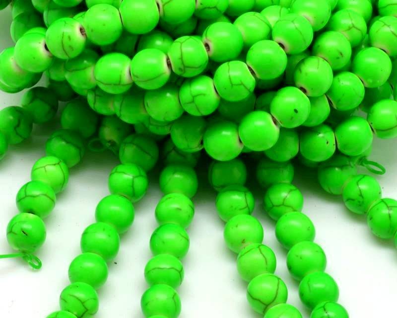 Turquoise. Dyed. Round. 8mm. Fluorescent green. Inn.1mm.approx.