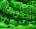 Turquoise. Dyed.Skull.14x10x12.5mm.Fluorescent green.Inn.1.5mm.approx.
