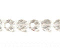 Glass beads, 14mm faceted round. clear. 13-14inch strand.
