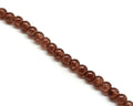 Crackle Glass. Round. 10mm. Dark brown. 15-Inch Strand.